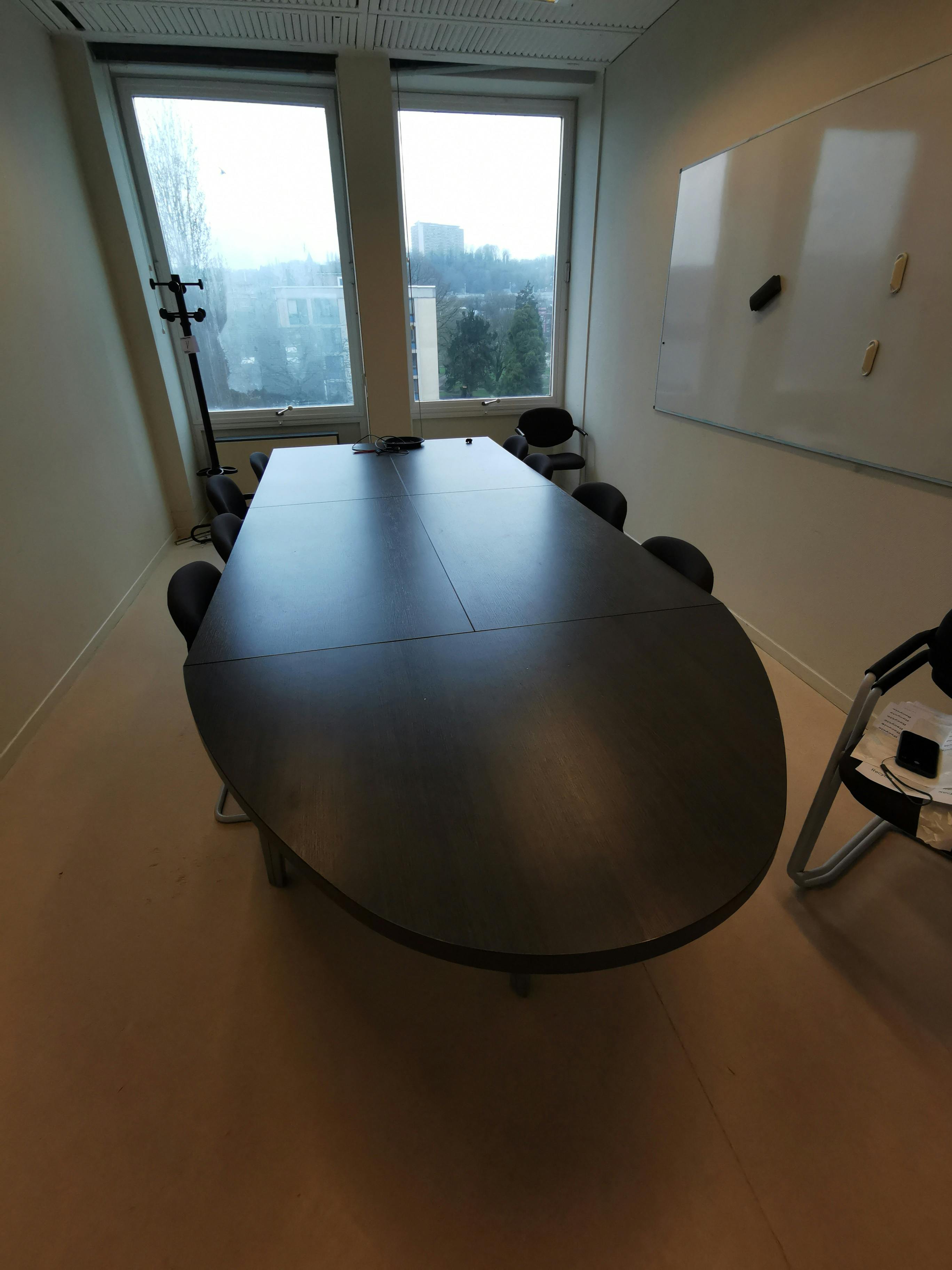 Large dark wood meeting table on grey legs - Relieve Furniture