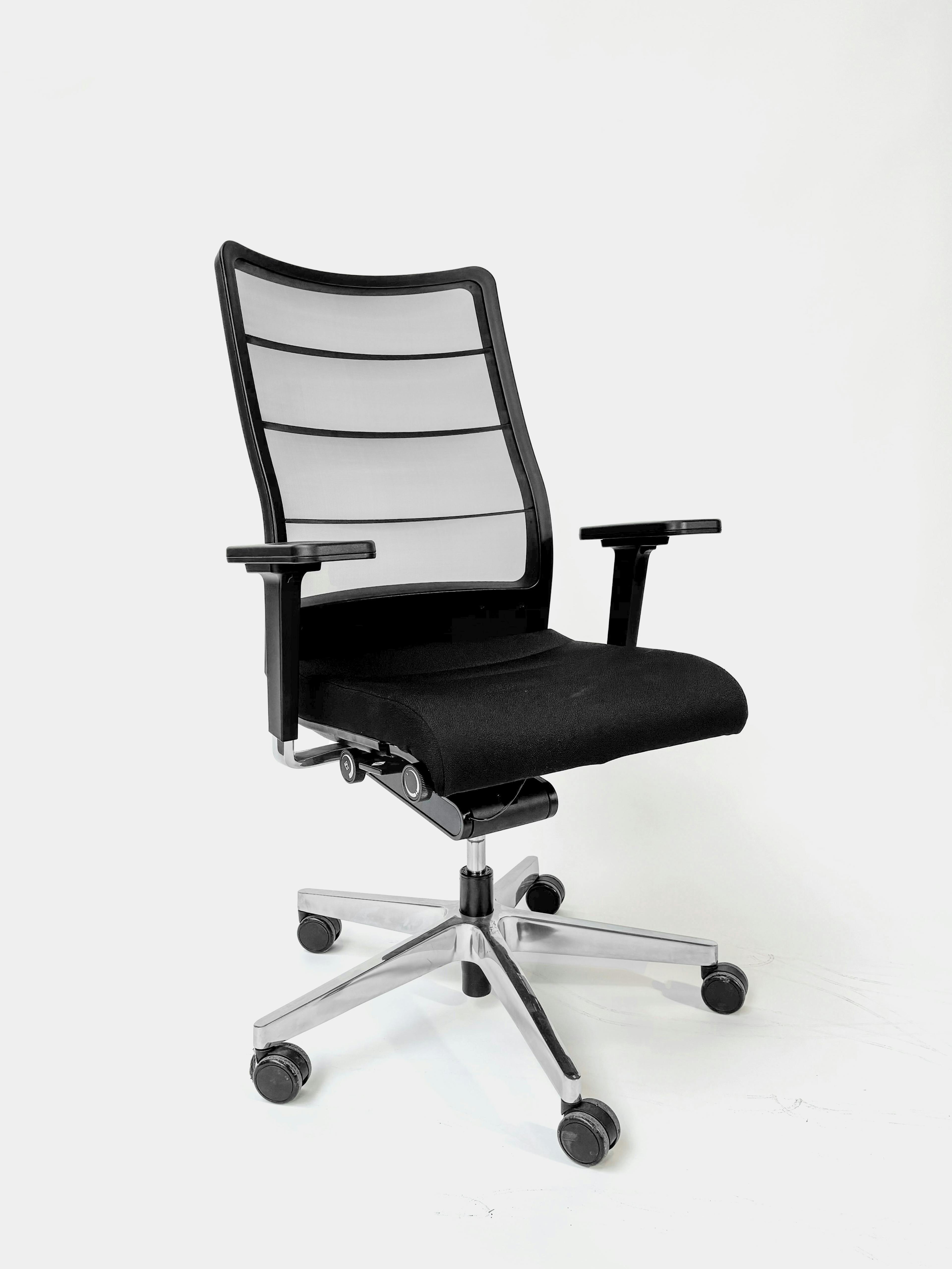 INTERSTUHL Black office chair with mesh back  - Relieve Furniture